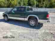 2002 Dodge Dakota SLT z VIN 1B7HG48N22S644998, wystawiony jako Copart lot #70816255 z przebiegiem 233 735 mil mil oraz Szkoda całkowita • Salvage title. Historia ofert i sprzedaży dostępna na DreamBid. Obrazek 2.