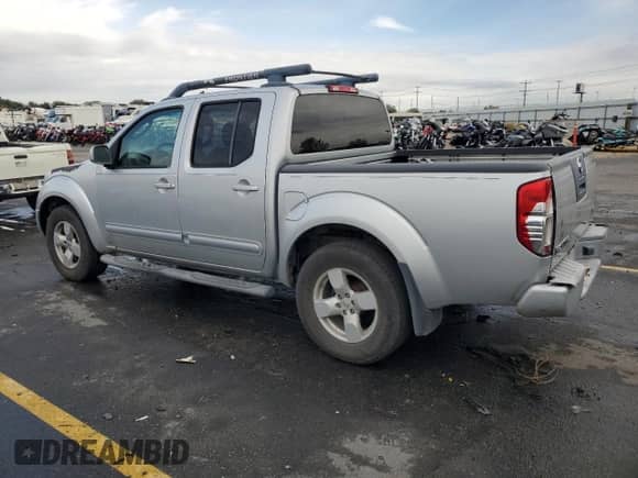 2005 Nissan Frontier SE with VIN 1N6AD07U75C451351, listed as a Copart auction lot 82265025 with 198,128 mi miles and Clean title. Bid and sale history available at DreamBid. Image 2.