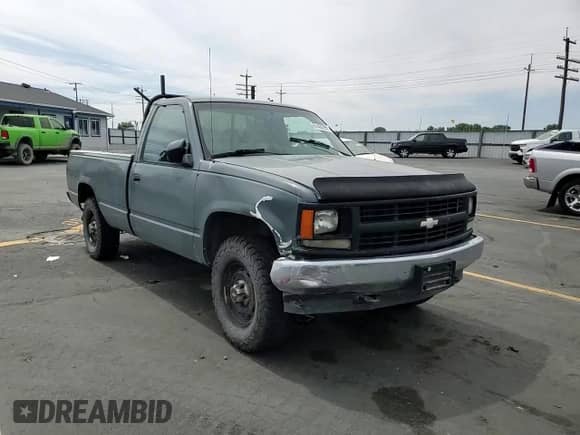 1994 Chevrolet Silverado 2500 с VIN 1GCFK24K5RZ275125, выставлен на аукционе Copart как лот 61460855 с пробегом 238 068 миль миль и Списание • Salvage title. История ставок и продаж доступна на DreamBid. Изображение 13.