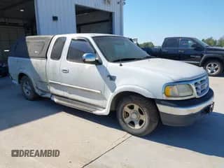 1999 Ford F-150 с VIN 1FTRX17W0XKB32371, выставлен на аукционе IAAI как лот 43457398 с пробегом Не указан миль и . История ставок и продаж доступна на DreamBid. Изображение 1.