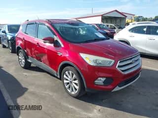 2017 Ford Escape Titanium with VIN 1FMCU0JD0HUC49319, listed as a IAAI auction lot 43280683 with 124,893 mi miles and . Bid and sale history available at DreamBid. Image 1.