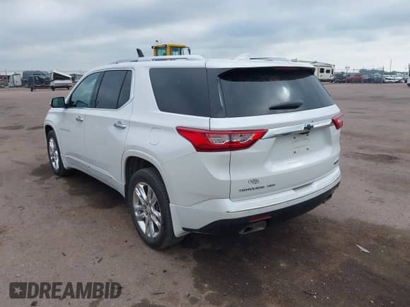 2021 Chevrolet Traverse High Country z VIN 1GNEVNKW6MJ136436, wystawiony jako IAAI lot #42879320 z przebiegiem 71 677 mil mil oraz . Historia ofert i sprzedaży dostępna na DreamBid. Obrazek 3.