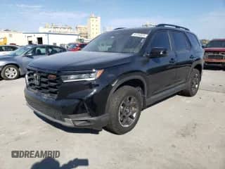 2023 Honda Pilot TrailSport with VIN 5FNYG1H66PB058087, listed as a Copart auction lot 84754824 with 26,278 mi miles and Salvage title. Bid and sale history available at DreamBid. Image 1.