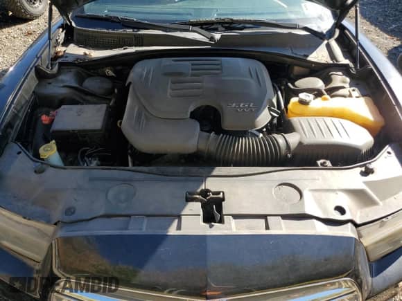 2012 Dodge Charger SE with VIN 2C3CDXBG0CH162588, listed as a Copart auction lot 82660735 with 188,409 mi miles and Clean title. Bid and sale history available at DreamBid. Image 11.