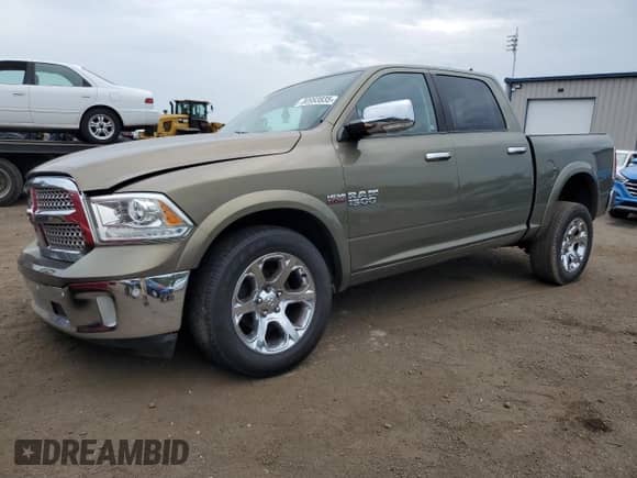 2014 Ram 1500 Laramie with VIN 1C6RR7NT3ES453198, listed as a Copart auction lot 80993835 with 79,321 mi miles and Salvage title. Bid and sale history available at DreamBid. Image 1.
