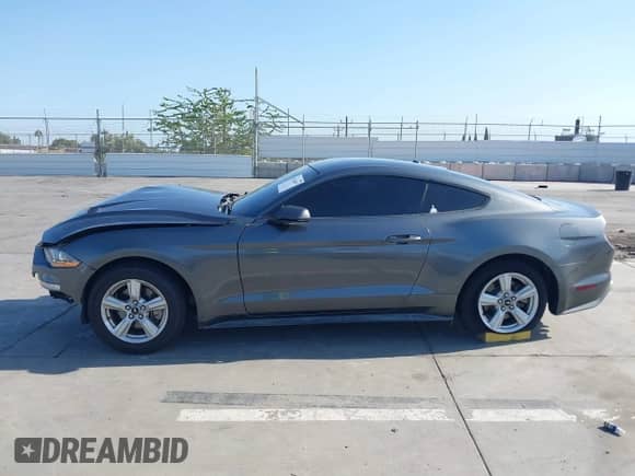 2019 Ford Mustang EcoBoost with VIN 1FA6P8TH2K5169700, listed as a IAAI auction lot 43126097 with 78,750 mi miles and . Bid and sale history available at DreamBid. Image 14.