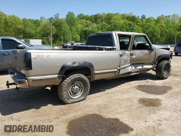 2000 Chevrolet Silverado 3500 с VIN 1GCHK33J6YF516293, выставлен на аукционе Copart как лот 53083035 с пробегом 220 219 миль миль и Списание • Salvage title. История ставок и продаж доступна на DreamBid. Изображение 3.