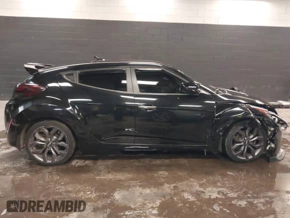 2015 Hyundai Veloster RE:FLEX with VIN KMHTC6AD2FU223615, listed as a IAAI auction lot 41388773 with 111,381 mi miles and . Bid and sale history available at DreamBid. Image 13.
