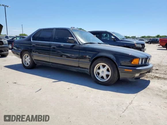 1994 BMW 7 Series с VIN WBAGD4326RDE68022, выставлен на аукционе Copart как лот 57808115 с пробегом 220 431 миль миль и Чистый • Clean title. История ставок и продаж доступна на DreamBid. Изображение 4.