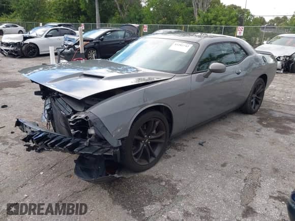 2018 Dodge Challenger T/A with VIN 2C3CDZBTXJH311594, listed as a IAAI auction lot 43202742 with 76,854 mi miles and . Bid and sale history available at DreamBid. Image 17.