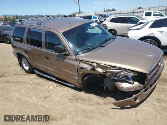 2000 Dodge Durango with VIN 1B4HS28Z2YF209533, listed as a Copart auction lot 58755995 with 239,809 mi miles and Salvage title. Bid and sale history available at DreamBid. Image 4.