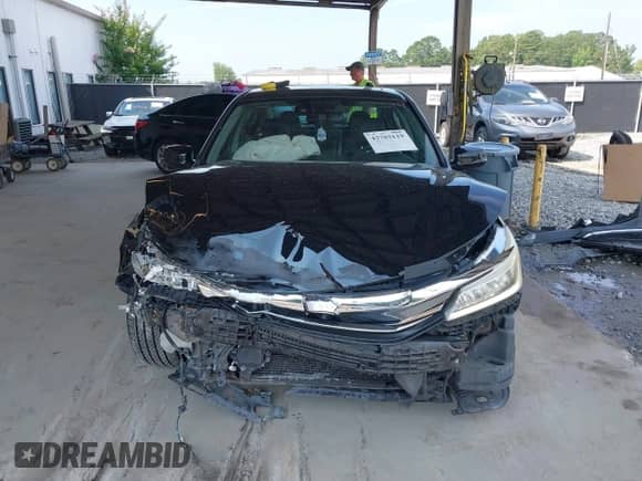 2017 Honda Accord Touring with VIN 1HGCR3F90HA023926, listed as a IAAI auction lot 42702119 with 108,379 mi miles and . Bid and sale history available at DreamBid. Image 12.