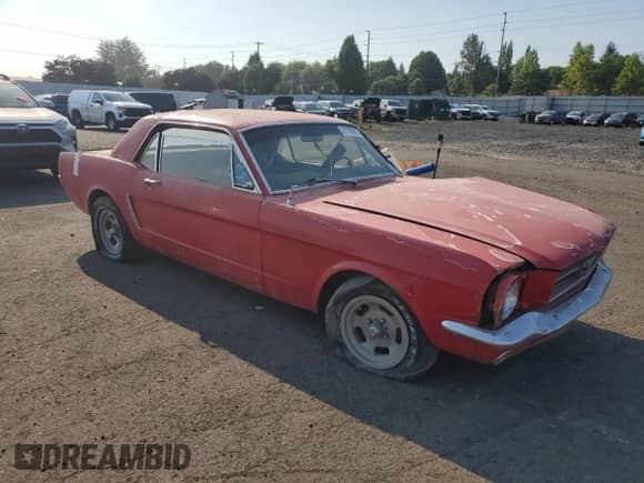 1965 Ford Mustang with VIN 5R07T232058, listed as a Copart auction lot 71192655 with 59,000 mi miles and Salvage title. Bid and sale history available at DreamBid. Image 4.
