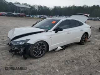 2022 Hyundai Sonata N Line с VIN KMHL14JC2NA233627, выставлен на аукционе Copart как лот 83751315 с пробегом 45 977 миль миль и Списание • Salvage title. История ставок и продаж доступна на DreamBid. Изображение 1.