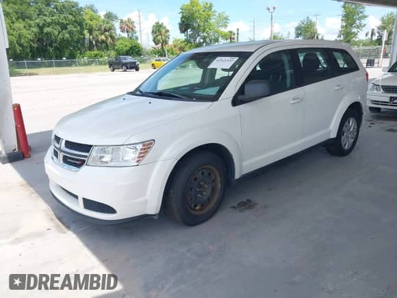 2015 Dodge Journey SE с VIN 3C4PDCAB7FT511723, выставлен на аукционе IAAI как лот 42521332 с пробегом 201 723 миль миль и . История ставок и продаж доступна на DreamBid. Изображение 2.