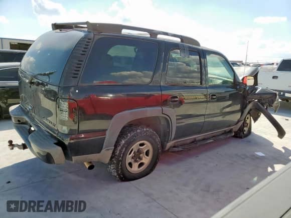 2003 Chevrolet Tahoe Z71 с VIN 1GNEK13Z63R126872, выставлен на аукционе Copart как лот 85562125 с пробегом Не указан миль и Списание • Salvage title. История ставок и продаж доступна на DreamBid. Изображение 3.
