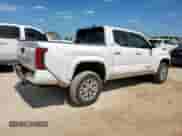 2025 Toyota Tacoma TRD Off Road z VIN 3TMLB5JN9SM139476, wystawiony jako Copart lot #81088195 z przebiegiem 9 863 mil mil oraz Szkoda całkowita • Salvage title. Historia ofert i sprzedaży dostępna na DreamBid. Obrazek 3.