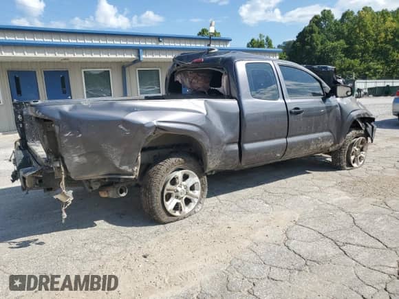 2017 Toyota Tacoma SR with VIN 5TFSX5EN3HX051453, listed as a Copart auction lot 67527665 with 102,709 mi miles and Salvage title. Bid and sale history available at DreamBid. Image 3.