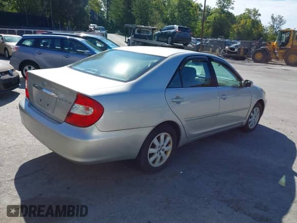 2004 Toyota Camry LE with VIN 4T1BE30K54U928149, listed as a IAAI auction lot 43178615 with 197,340 mi miles and . Bid and sale history available at DreamBid. Image 4.