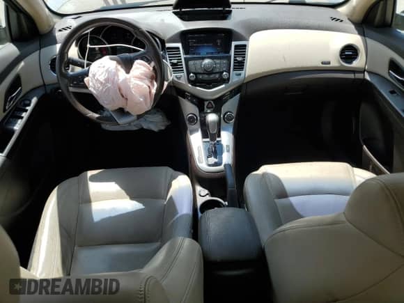 2014 Chevrolet Cruze 2LT с VIN 1G1PE5SB2E7164515, выставлен на аукционе Copart как лот 70232365 с пробегом 118 554 миль миль и Списание • Salvage title. История ставок и продаж доступна на DreamBid. Изображение 8.