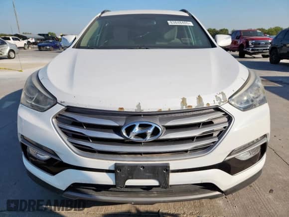 2018 Hyundai Santa Fe 2.4L z VIN 5XYZU3LB3JG528542, wystawiony jako Copart lot #83848405 z przebiegiem 58 071 mil mil oraz Szkoda całkowita • Salvage title. Historia ofert i sprzedaży dostępna na DreamBid. Obrazek 5.