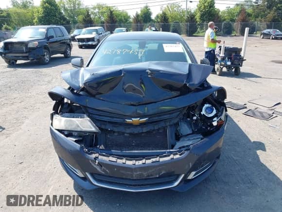2014 Chevrolet Impala LS with VIN 2G11Y5SL9E9210961, listed as a IAAI auction lot 42787457 with 318,527 mi miles and . Bid and sale history available at DreamBid. Image 12.