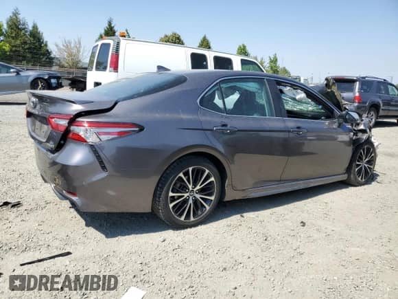 2019 Toyota Camry Hybrid LE с VIN 4T1B21HK2KU513773, выставлен на аукционе Copart как лот 70576645 с пробегом Не указан миль и Списание • Salvage title. История ставок и продаж доступна на DreamBid. Изображение 3.
