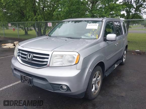 2014 Honda Pilot EX-L with VIN 5FNYF4H79EB009136, listed as a IAAI auction lot 42513928 with 84,965 mi miles and . Bid and sale history available at DreamBid. Image 2.