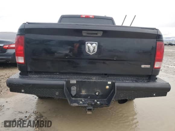 2011 Dodge RAM z VIN 3D73M3CL5BG633980, wystawiony jako Copart lot #74194624 z przebiegiem 219 249 mil mil oraz Szkoda całkowita • Salvage title. Historia ofert i sprzedaży dostępna na DreamBid. Obrazek 6.