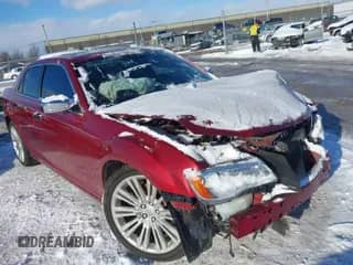 2014 Chrysler 300 C with VIN 2C3CCAET9EH104233, listed as a IAAI auction lot 41581466 with 127,772 mi miles and . Bid and sale history available at DreamBid. Image 1.