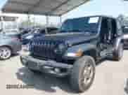 2021 Jeep Wrangler Unlimited Sport Altitude with VIN 1C4HJXDN5MW670810, listed as a IAAI auction lot 42562339 with 136,697 mi miles and . Bid and sale history available at DreamBid. Image 2.