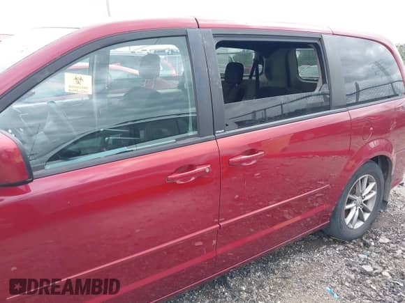 2014 Dodge Grand Caravan SE 30th Anniversary z VIN 2C4RDGBG8ER223253, wystawiony jako IAAI lot #43016866 z przebiegiem 169 591 mil mil oraz . Historia ofert i sprzedaży dostępna na DreamBid. Obrazek 14.