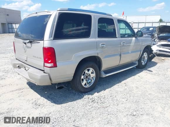 2004 Cadillac Escalade with VIN 1GYEC63T44R166653, listed as a IAAI auction lot 43142743 with 191,983 mi miles and . Bid and sale history available at DreamBid. Image 4.