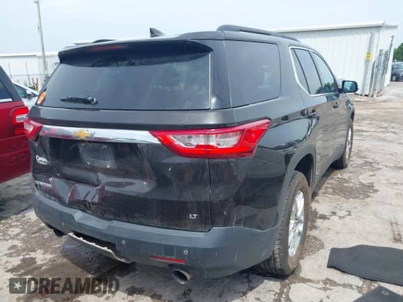 2019 Chevrolet Traverse LT Cloth z VIN 1GNERGKW5KJ141107, wystawiony jako IAAI lot #42752346 z przebiegiem 160 045 mil mil oraz . Historia ofert i sprzedaży dostępna na DreamBid. Obrazek 4.