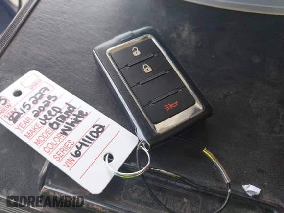 2023 Jeep Grand Cherokee Laredo with VIN 1C4RJHAG1PC641102, listed as a IAAI auction lot 42457130 with 50,533 mi miles and . Bid and sale history available at DreamBid. Image 11.