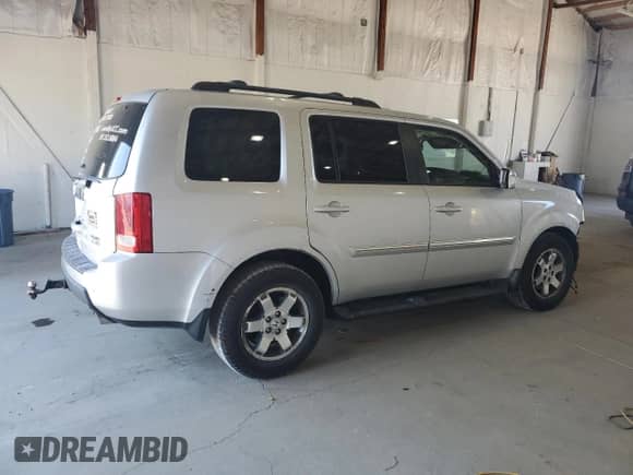 2009 Honda Pilot Touring с VIN 5FNYF48929B002908, выставлен на аукционе Copart как лот 81255035 с пробегом Не указан миль и Списание • Salvage title. История ставок и продаж доступна на DreamBid. Изображение 3.