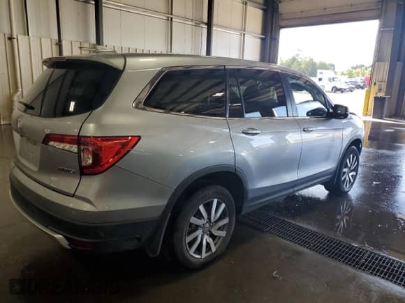 2020 Honda Pilot EX with VIN 5FNYF6H35LB060929, listed as a Copart auction lot 69142125 with 56,125 mi miles and Salvage title. Bid and sale history available at DreamBid. Image 3.