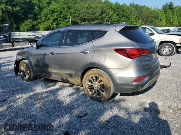 2018 Hyundai Santa Fe 2.0T с VIN 5NMZU4LA5JH086141, выставлен на аукционе Copart как лот 59622905 с пробегом 145 515 миль миль и Списание • Salvage title. История ставок и продаж доступна на DreamBid. Изображение 2.