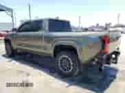 2024 Toyota Tacoma SR5 with VIN 3TMLB5FN1RM001210, listed as a Copart auction lot 61857315 with 26,388 mi miles and Salvage title. Bid and sale history available at DreamBid. Image 2.