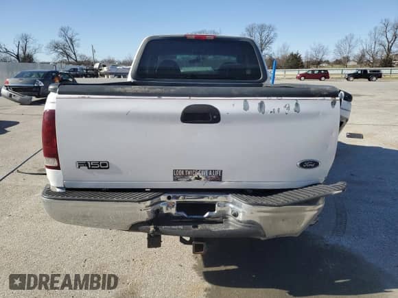 2000 Ford F-150 XL with VIN 1FTRX18W5YKB13685, listed as a Copart auction lot 48286865 with 249,053 mi miles and Salvage title. Bid and sale history available at DreamBid. Image 6.