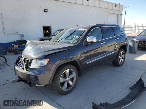 2012 Jeep Grand Cherokee Overland Summit z VIN 1C4RJFCT3CC251157, wystawiony jako Copart lot #84759595 z przebiegiem 213 532 mil mil oraz Szkoda całkowita • Salvage title. Historia ofert i sprzedaży dostępna na DreamBid. Obrazek 1.