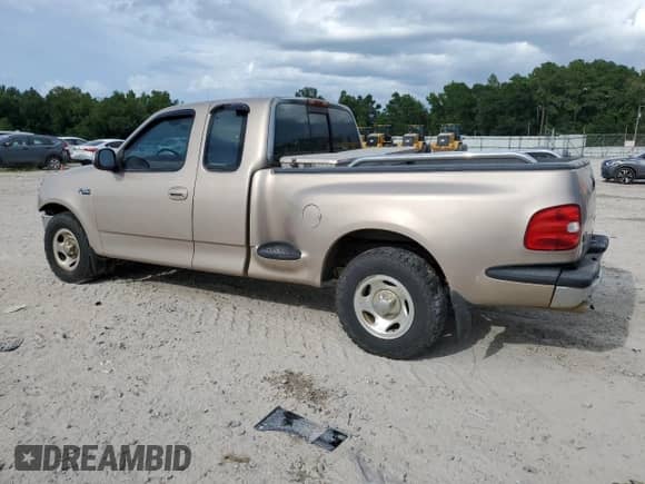 1997 Ford F-150 XL с VIN 1FTDX07W5VKB79929, выставлен на аукционе Copart как лот 63647125 с пробегом 82 998 миль миль и Списание • Salvage title. История ставок и продаж доступна на DreamBid. Изображение 2.