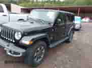 2022 Jeep Wrangler Unlimited Sahara with VIN 1C4HJXEGXNW267813, listed as a IAAI auction lot 40331024 with 30,905 mi miles and . Bid and sale history available at DreamBid. Image 2.