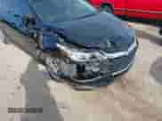 2019 Chevrolet Cruze z VIN 1G1BJ5SM5K7105395, wystawiony jako IAAI lot #42448599 z przebiegiem 126 567 mil mil oraz . Historia ofert i sprzedaży dostępna na DreamBid. Obrazek 6.