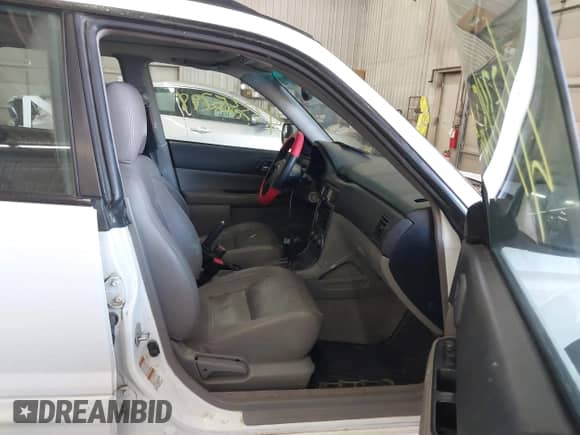 2004 Subaru Forester XS with VIN JF1SG65604H702031, listed as a IAAI auction lot 43345798 with 169,814 mi miles and . Bid and sale history available at DreamBid. Image 5.