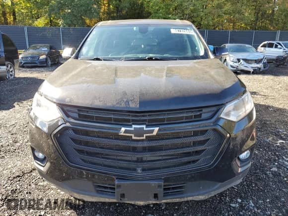 2021 Chevrolet Traverse LT with VIN 1GNEVHKW5MJ202945, listed as a Copart auction lot 85732685 with 104,680 mi miles and Clean title. Bid and sale history available at DreamBid. Image 5.