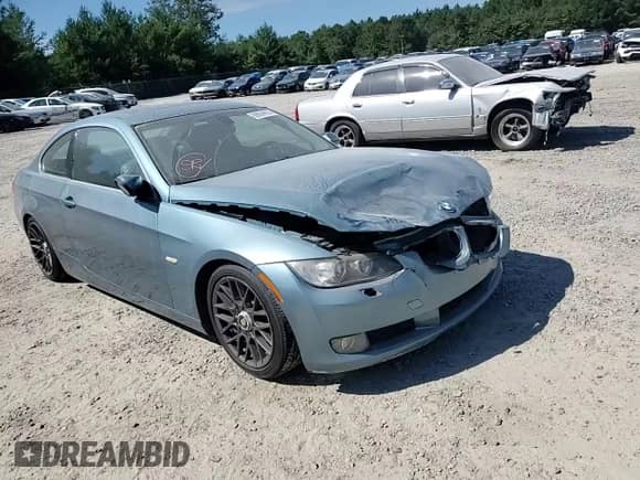 2007 BMW 3 Series 328xi with VIN WBAWV53507P077496, listed as a Copart auction lot 69664695 with 113,601 mi miles and Salvage title. Bid and sale history available at DreamBid. Image 13.