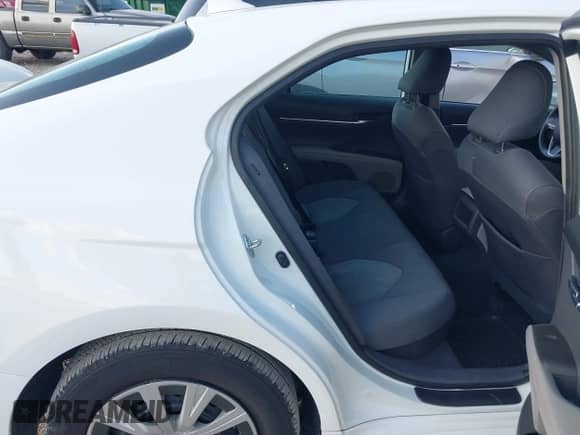 2021 Toyota Camry Hybrid LE with VIN 4T1C31AK7MU554477, listed as a IAAI auction lot 43395450 with 139,747 mi miles and . Bid and sale history available at DreamBid. Image 8.