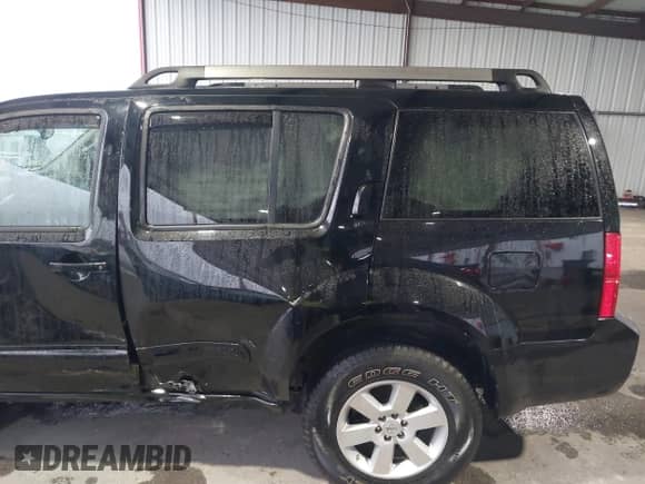 2011 Nissan Pathfinder LE z VIN 5N1AR1NB8BC633188, wystawiony jako IAAI lot #41608356 z przebiegiem 128 377 mil mil oraz . Historia ofert i sprzedaży dostępna na DreamBid. Obrazek 6.