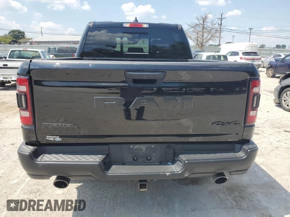 2022 Ram 1500 Rebel z VIN 1C6SRFLM7NN362506, wystawiony jako Copart lot #69181054 z przebiegiem 32 381 mil mil oraz Szkoda całkowita • Salvage title. Historia ofert i sprzedaży dostępna na DreamBid. Obrazek 6.